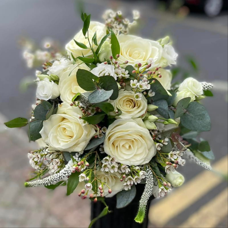 Bride with wedding flowers by K Flowers in Tullamore, Co. Offaly