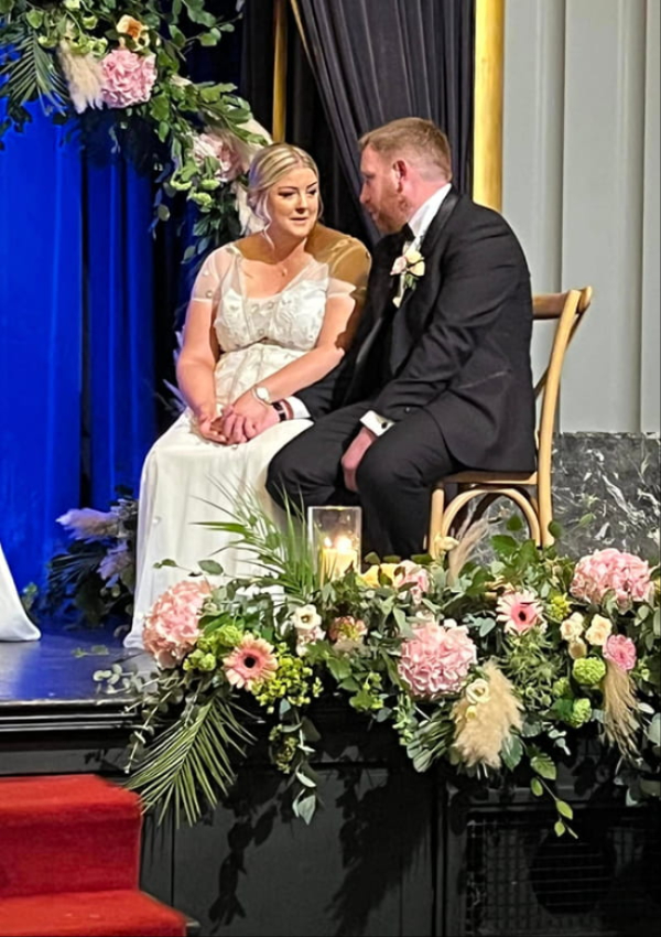 Bride and groom with wedding flowers by K Flowers Tullamore
