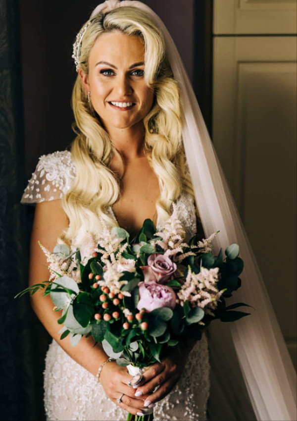 Bride holding a bespoke K Flowers wedding bouquet