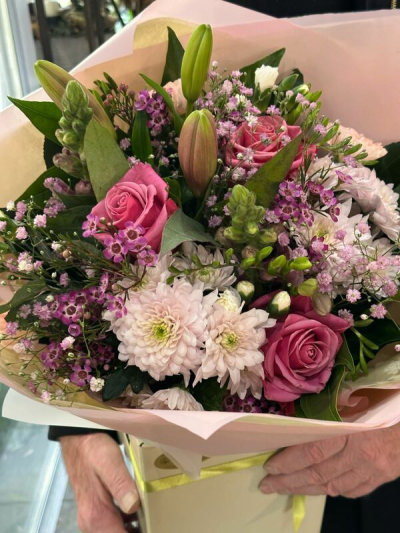 Endless Love - A beautiful hand-tied bouquet in soft pink and lilac tones, expertly arranged with seasonal flowers for a thoughtful gift.