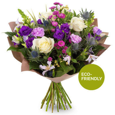 Pink Amethyst - A beautiful wrapped bouquet in soft pink, purple and white tones, finished with lush fresh greenery.