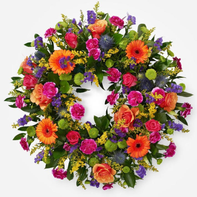 Vibrant Wreath - A classic wreath arranged using mixed flowers. Let us know your favourite colour combination and we’ll make it to order using the best available flowers.